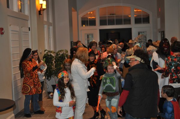 Wide shot children at halloween event